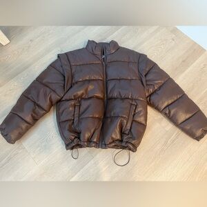 We wore what puffer jacket/can also be a vest oversized small